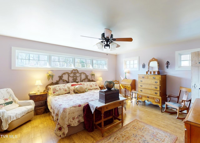 bedroom featuring ceiling fan and light wood-type flooring