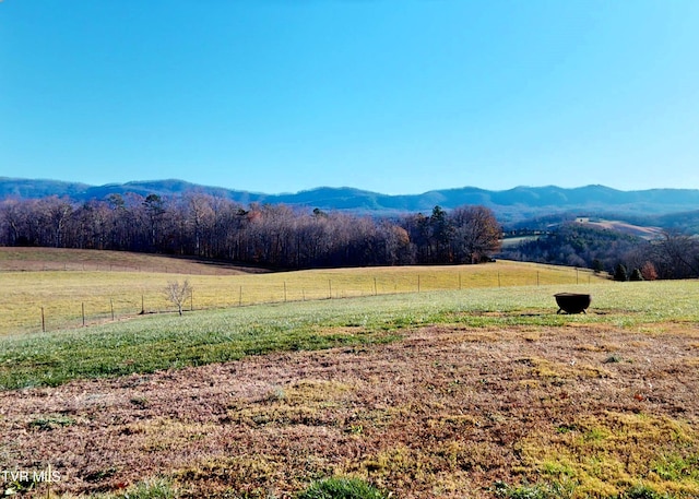 property view of mountains featuring a rural view