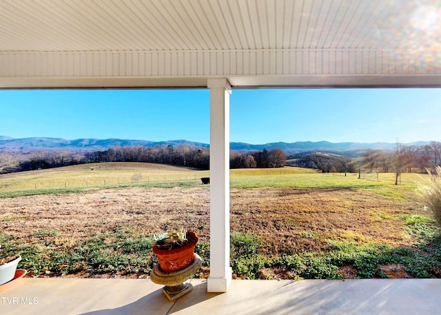 exterior space with a rural view