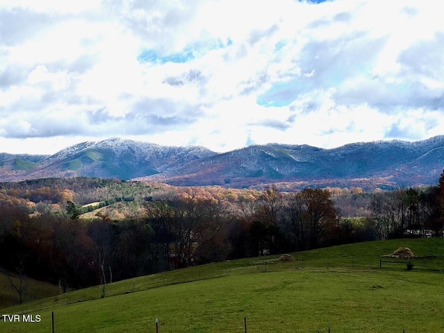 view of mountain feature with a rural view