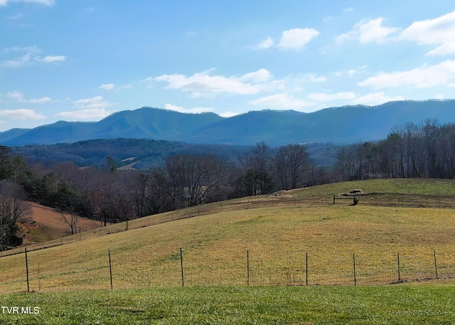 property view of mountains featuring a rural view