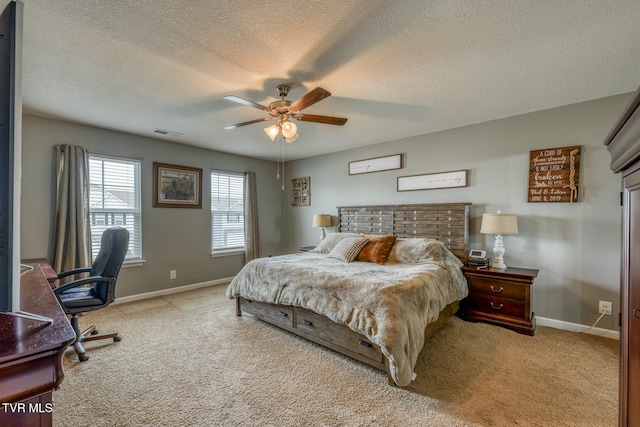 6758 Wildlife Cir, Piney Flats, TN 37686 - bedroom featuring ceiling fan, light colored carpet, and a textured ceiling