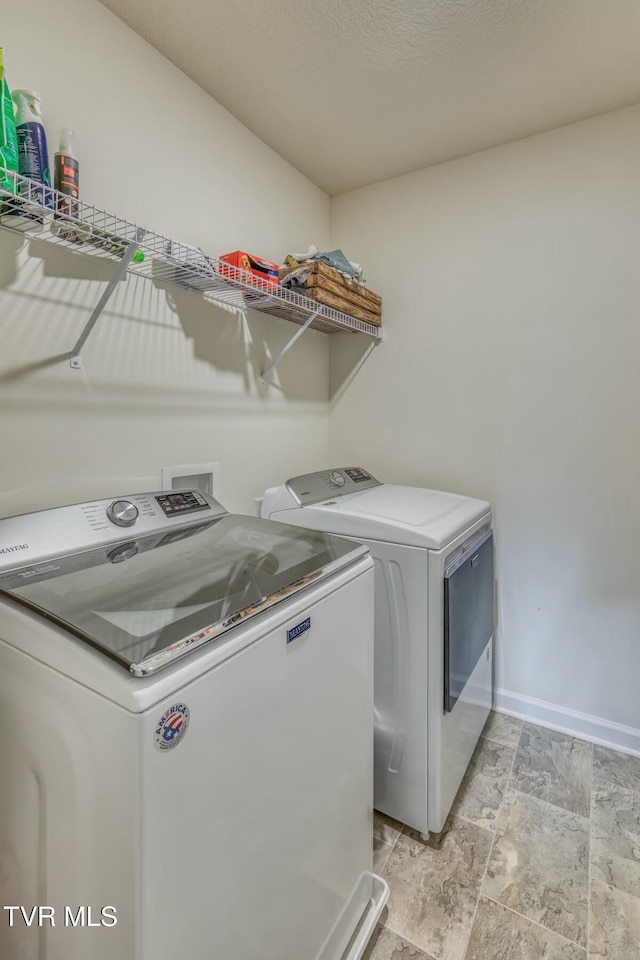 6758 Wildlife Cir, Piney Flats, TN 37686 - laundry room with washer and clothes dryer