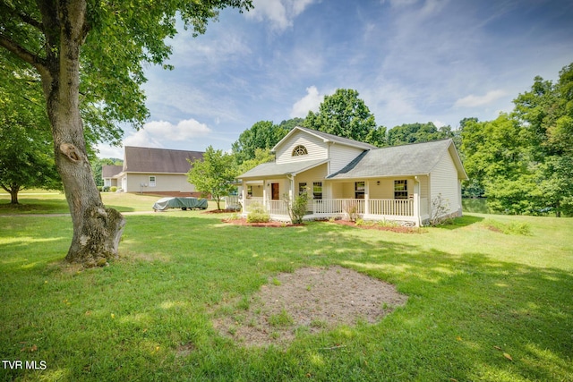 view of front of home featuring covered porch and a front lawn