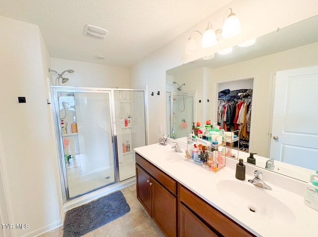 bathroom with vanity and walk in shower