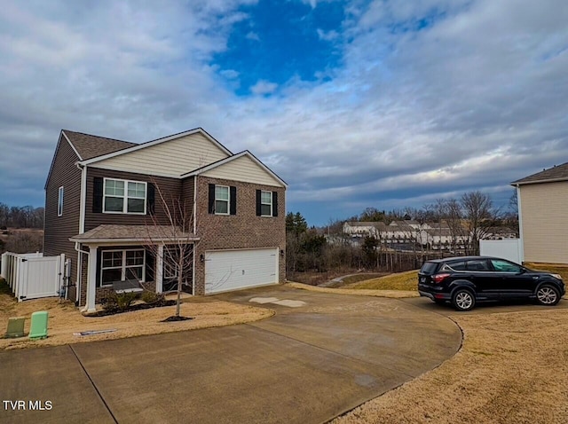 view of front of property featuring a garage