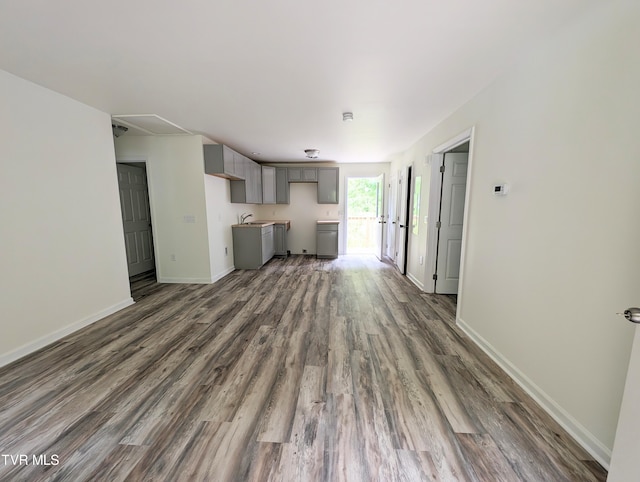 unfurnished living room featuring dark hardwood / wood-style flooring