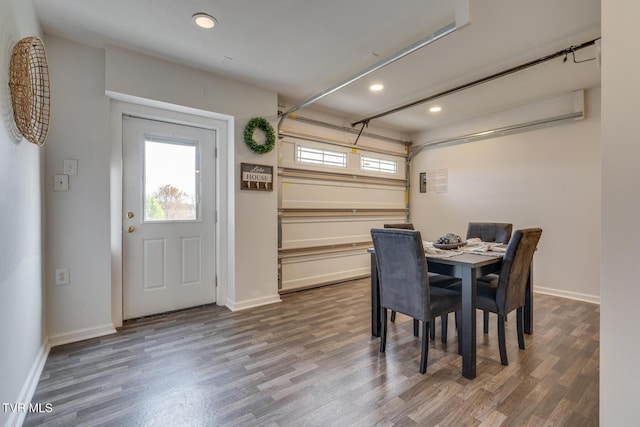 dining area with hardwood / wood-style flooring and a wealth of natural light