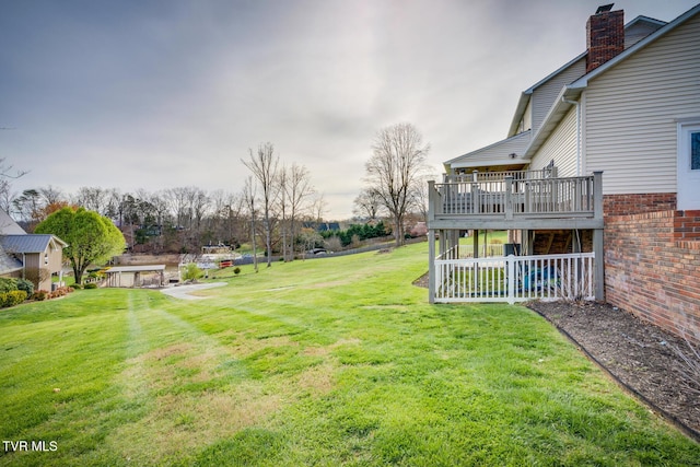 view of yard with a deck