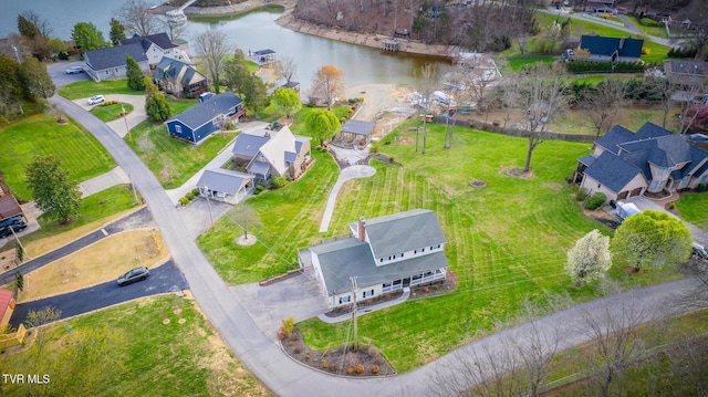 drone / aerial view featuring a water view