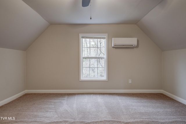 bonus room featuring ceiling fan, lofted ceiling, carpet floors, and a wall unit AC