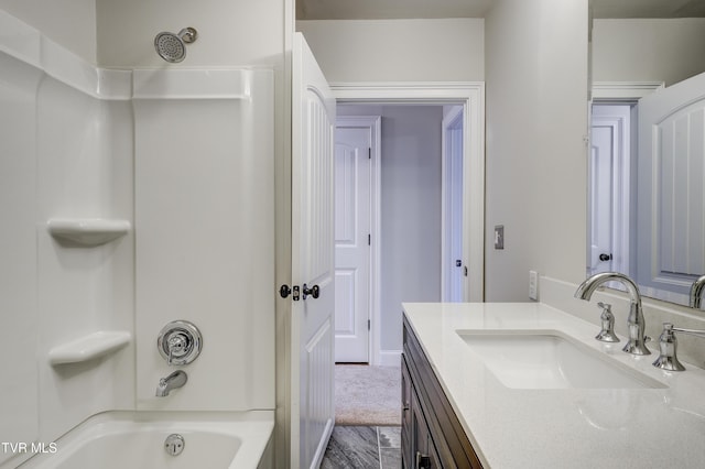 bathroom with shower / tub combination and vanity