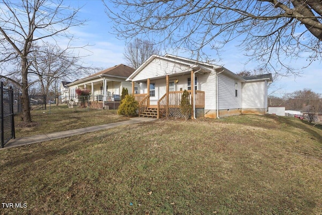 bungalow-style house featuring a porch and a front yard