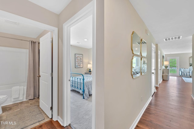 hall featuring hardwood / wood-style floors