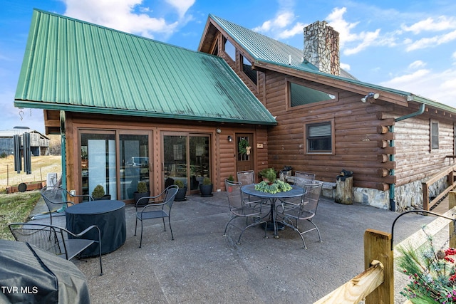 back of house featuring a patio