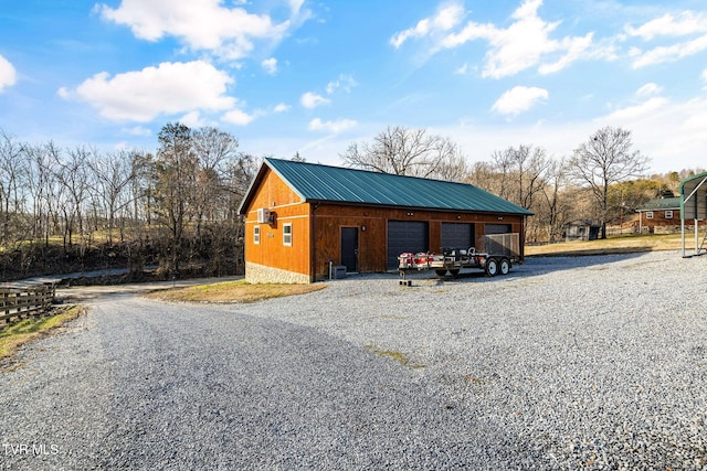 view of outbuilding featuring a garage