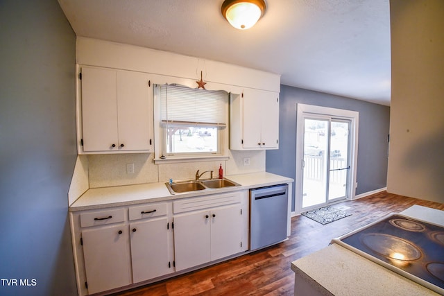 kitchen with white cabinetry, sink, cooktop, and dishwasher