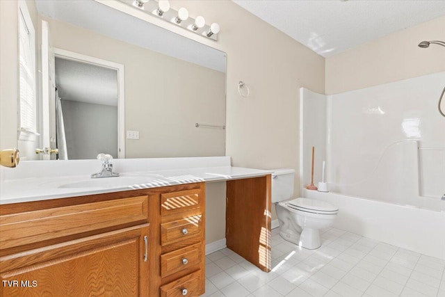 full bathroom featuring vanity, tile patterned floors, bathtub / shower combination, and toilet