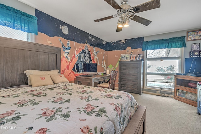 carpeted bedroom with ceiling fan