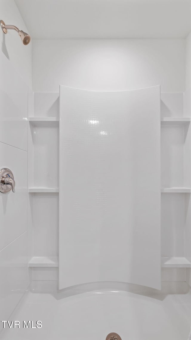 bathroom with a shower