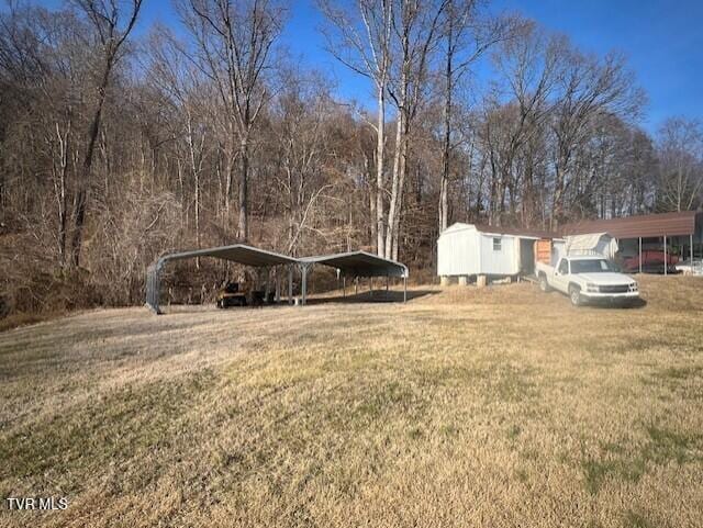 view of yard with a carport