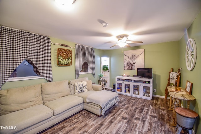 living room with hardwood / wood-style flooring and ceiling fan