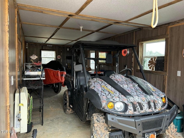 garage with wood walls