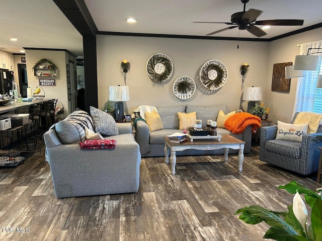 living room featuring crown molding, dark hardwood / wood-style floors, and ceiling fan