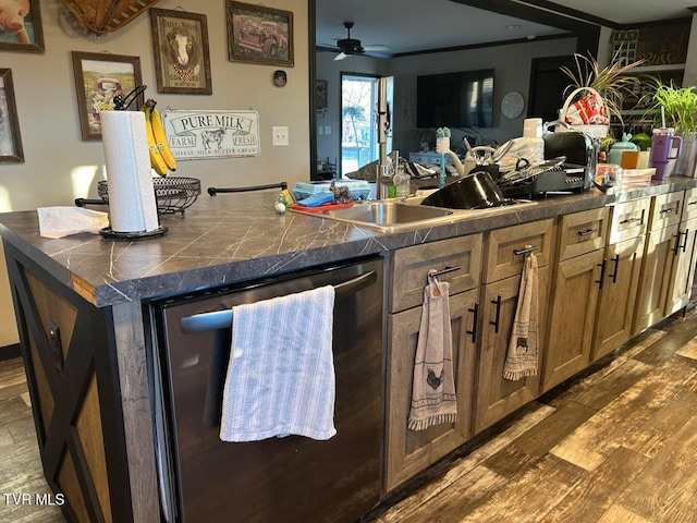 kitchen with dishwashing machine, hardwood / wood-style floors, sink, and ceiling fan