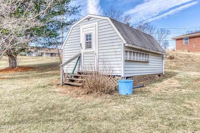 view of outdoor structure with a yard