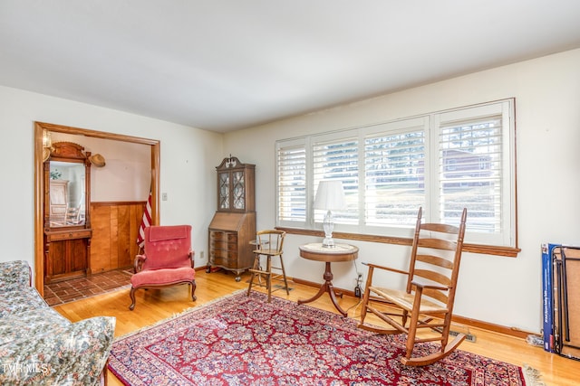 living area with wood-type flooring