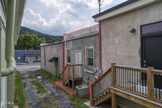 view of home's exterior featuring central AC unit