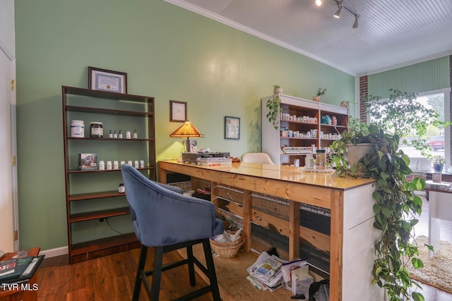 office featuring dark wood-type flooring and rail lighting