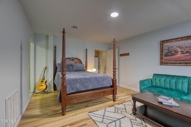 bedroom featuring hardwood / wood-style flooring