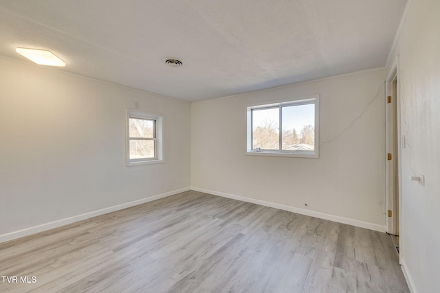 empty room featuring light hardwood / wood-style flooring