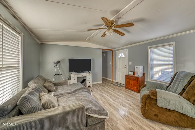 living room with vaulted ceiling with beams, crown molding, light hardwood / wood-style floors, and ceiling fan