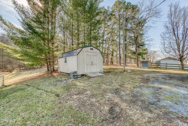 view of outdoor structure featuring a yard