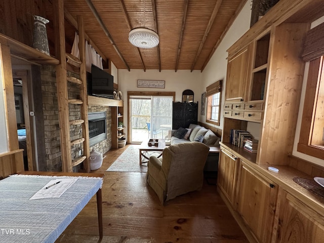 living room featuring dark hardwood / wood-style flooring, a fireplace, wooden ceiling, and beamed ceiling