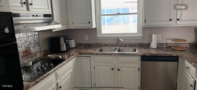 kitchen with black appliances, a sink, white cabinetry, and under cabinet range hood