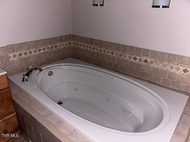 bathroom featuring a whirlpool tub