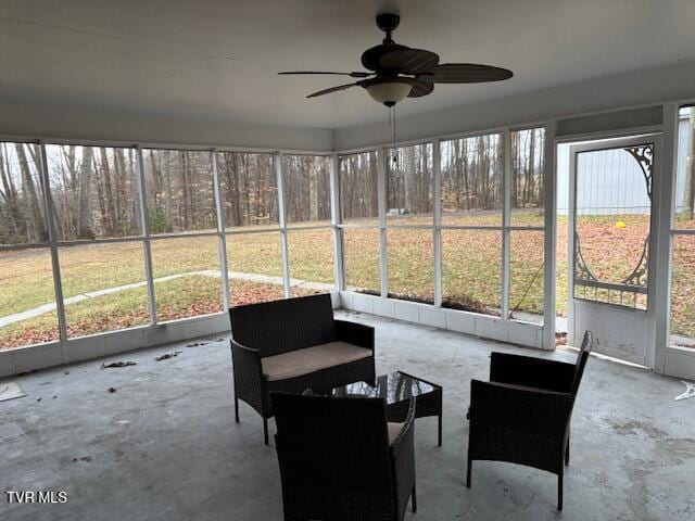 sunroom / solarium with ceiling fan