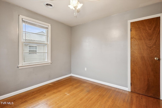 empty room featuring hardwood / wood-style flooring