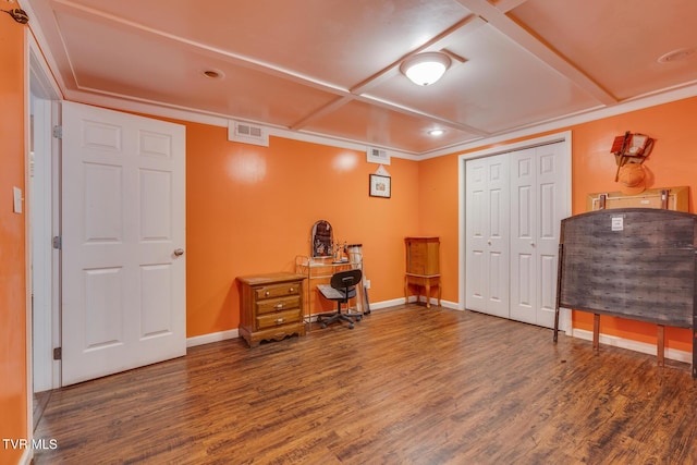 office area featuring ornamental molding and dark hardwood / wood-style flooring