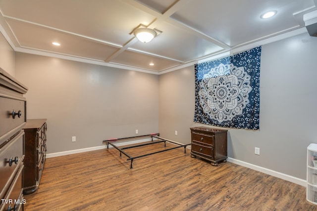 interior space featuring hardwood / wood-style flooring, crown molding, and coffered ceiling