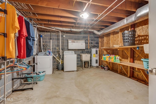 basement with independent washer and dryer, sink, and water heater