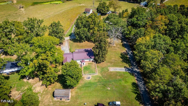 birds eye view of property featuring a rural view