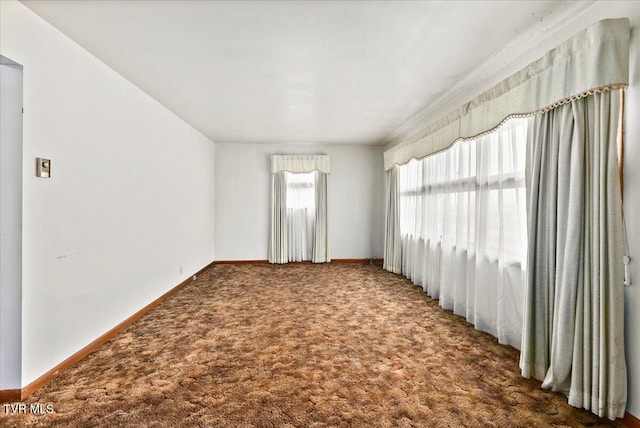 unfurnished room with carpet floors