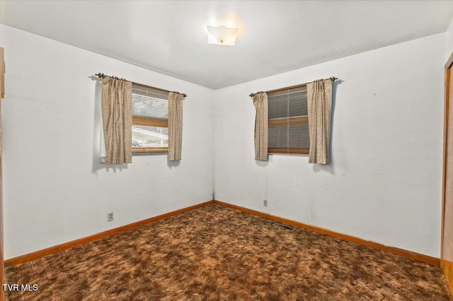 spare room with carpet