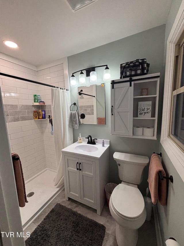 bathroom with vanity, toilet, and a shower with shower curtain