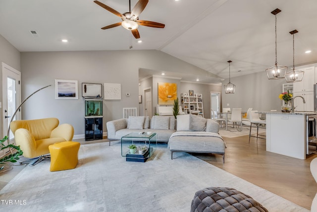 262 Harps Ln, Gray, TN 37615 - living room featuring lofted ceiling, a ceiling fan, recessed lighting, light wood-type flooring, and baseboards